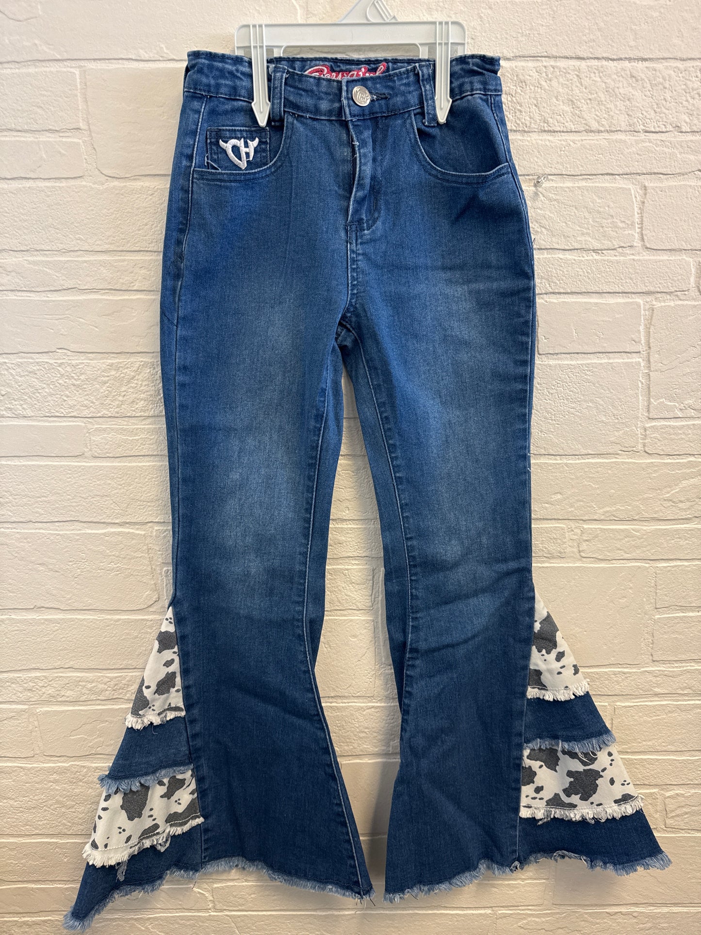 7 Cowgirl Hardware Cow Print Bell Bottoms